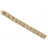 14 krt. gouden armband lengte: 19 cm., breed: 19 mm., gewicht: 29 gram