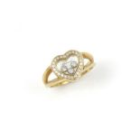 18 krt. gouden 'Happy diamonds' ring met vele achtkantige en 3 briljant geslepen diamanten,