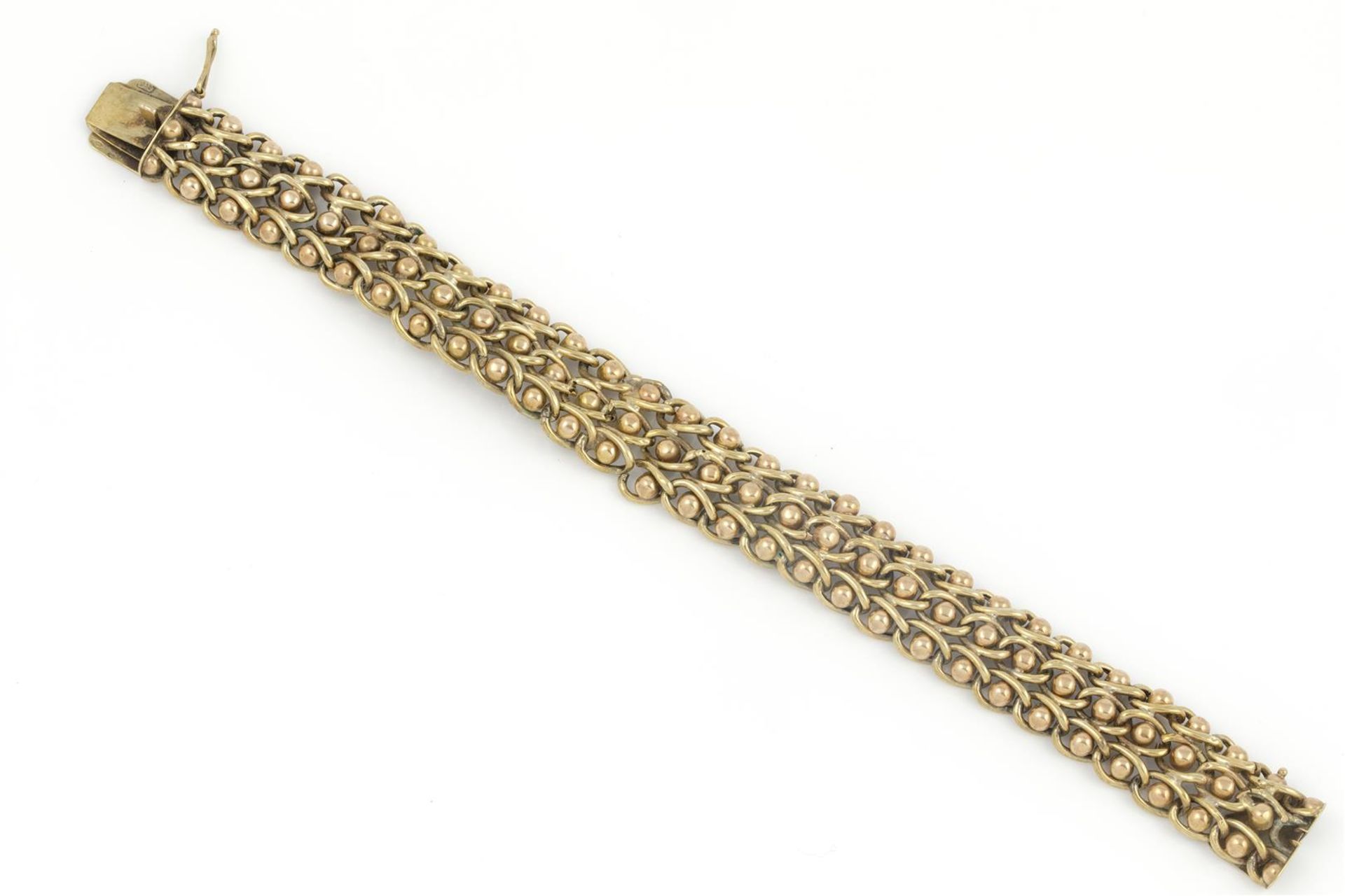 14 krt gouden armband, lengte: 19 cm., breed: 16 mm., gewicht: 26,8 gram- - -29.00 % buyer's premium