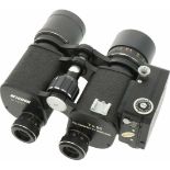 Een Nicnon No. 740107 - verrekijker met camera.A Nikon No. 740107 - binoculars with camera.