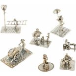 (7) lot diverse miniaturen zilver.W.o. pottenbakker, accordeonist en paraplu verkoper. Nederland,