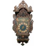 Een Friese stoelklok. Nederland, 19e eeuw.A Frisian chair clock. The Netherlands, 19th century.