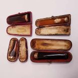 (Antiek) Goud/amber, 4 stuks mondstukken in foedralen met gouden monturen, 19/20 eeuw.Goud/amber,