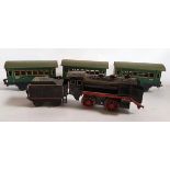 (Curiosa) Blikken trein met wagonsZwarte blikken locomotief met kolenwagen en 3 wagons Conditie: