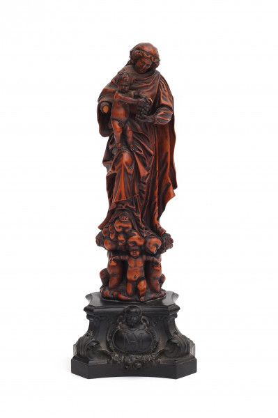 A South Netherlandish, probably Malines, boxwood sculpture of the Virgin and Child supported by