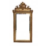 A facet cut mirror in gilt frame. 19/20th centuryCirca 165 x 85 cm.