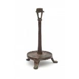 A bronze candlestick. Late 14th, early 15th century. Christie's, London, sold a comparable