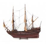 A wooden model ship, galleon under full sail. Early 20th centuryHoogte 79 cm.