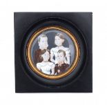 A round portrait miniature on ivory, four children. Not signed, 19th century.Diameter 9 cm.