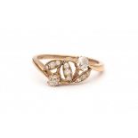 A rose gold floral ring. Set with old brilliant cut diamonds. Colour predominantly I-J and one