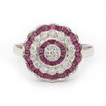 A 18 krt white gold entourage ring. Art Deco stijl. Set with baguette cut natural rubies, total