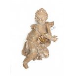 A basswood angel. Possibly Northern Netherlands. 18th century. With traces of gilding.Lengte 59,5