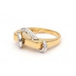 A 18 krt yellow and white gold ring. Modern. Set with brilliant cut diamonds, total ca. 0.05 ct,