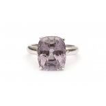A 18 krt white gold ring. Set with a natural Burma, cushion cut purple spinel, ca. 10.61 ct. Gross
