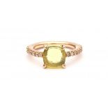 A 18 krt rose gold ring. Pomellato, model Baby. Set with a cushion cut lemon quartz and champagne