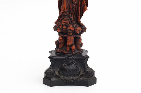 A South Netherlandish, probably Malines, boxwood sculpture of the Virgin and Child supported by - Image 2 of 4