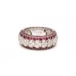 A 18 krt white gold ring. Chopard serie nr 2698302. Set with facetted rubies, total ca. 1,97 ct