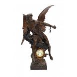 A bronzed metal French salon clock encorporated in a sculpture by Emile Louis Picault, 'la pensée
