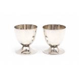 A pair of two Dutch silver egg stands. Maker's mark Zilverfabriek Voorschoten. Year letter 1932.