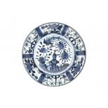 A Japanese blue and white Arita dish, decorated with phoenix and pommegranate. Edo period (1603-