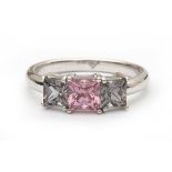 A 18 krt white gold ring spinel. Set with three square cut spinels, total ca. 1.98 ct. Pink spinel