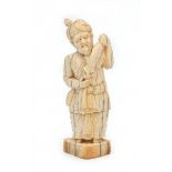 A Persian ivory sculpture, fishmonger, dressed in traditional robes holding a fish. 19th