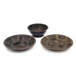 A set of of two bronze plates and a bowl, decorated in high relief with fish, crab and shrimp and