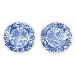 Apair of Chinese blue and white plates, decorated with flowers. Marked with an incense burner.