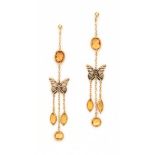 A pair of 18 krt yellow gold butterfly earrings. Italian. Set with facetted citrine. Gross weight