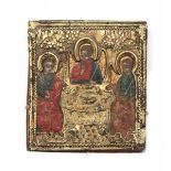 A Russian travel icon, three saints with a metal riza. 19th century.8,5 x 8 cm.