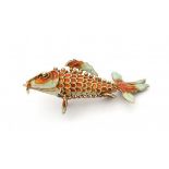 A gilded and enamelled silver pendant in the shape of an articulated koi carp. Gross weight ca. 6.