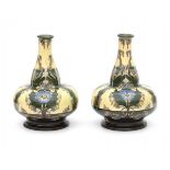 Wed. Brantjes & Co., PurmerendTwo ceramic flask-shaped vases with repeating pattern of blue