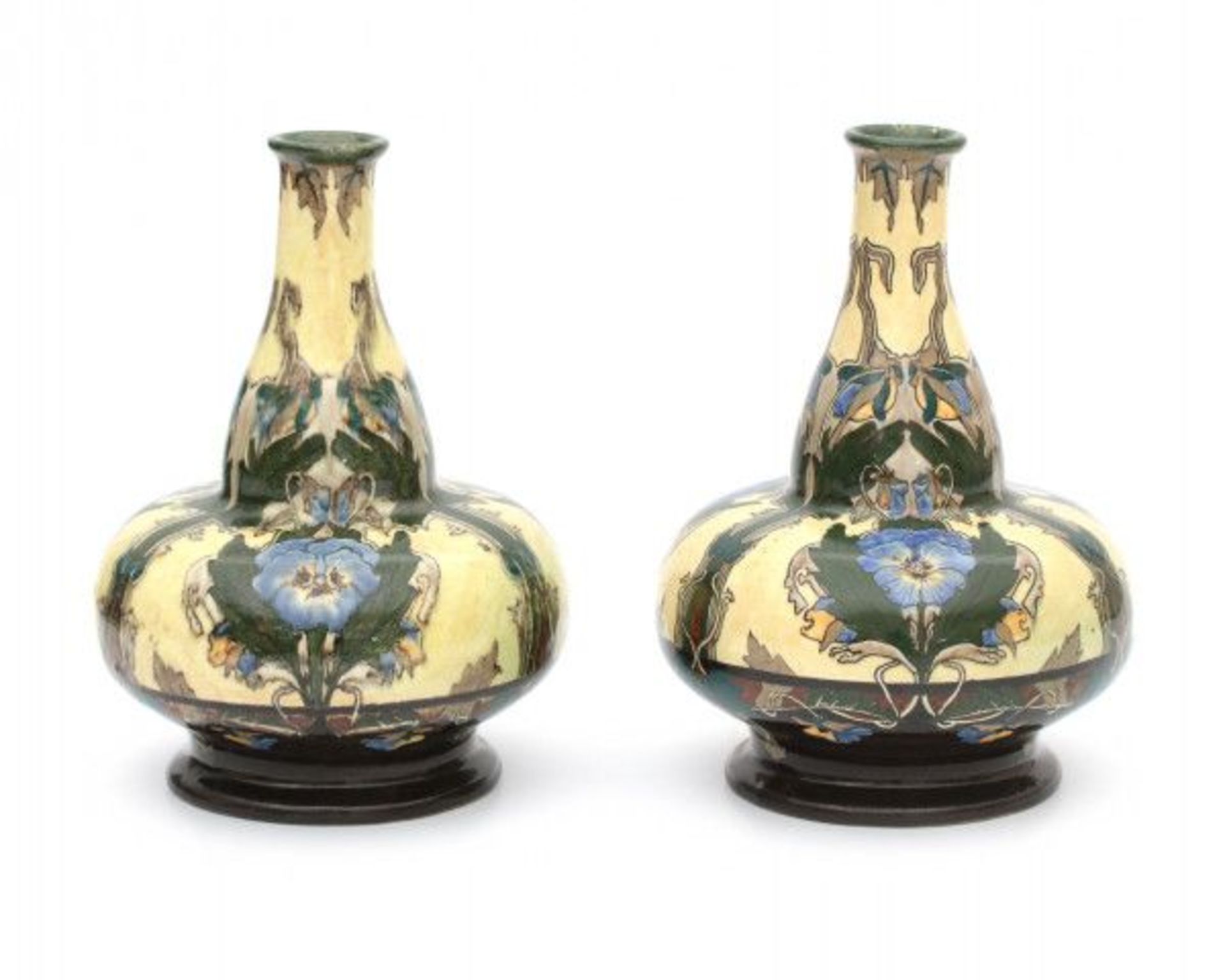 Wed. Brantjes & Co., PurmerendTwo ceramic flask-shaped vases with repeating pattern of blue