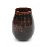 Stig Lindberg (1916-1982)A small brown and black glazed stoneware vase, signed underneath.10,5 cm.