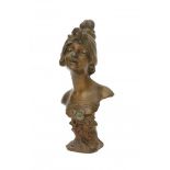 Julien Caussé (1869-1909)A patinated spelter buste, titled Cigalle, with moulded signature J.