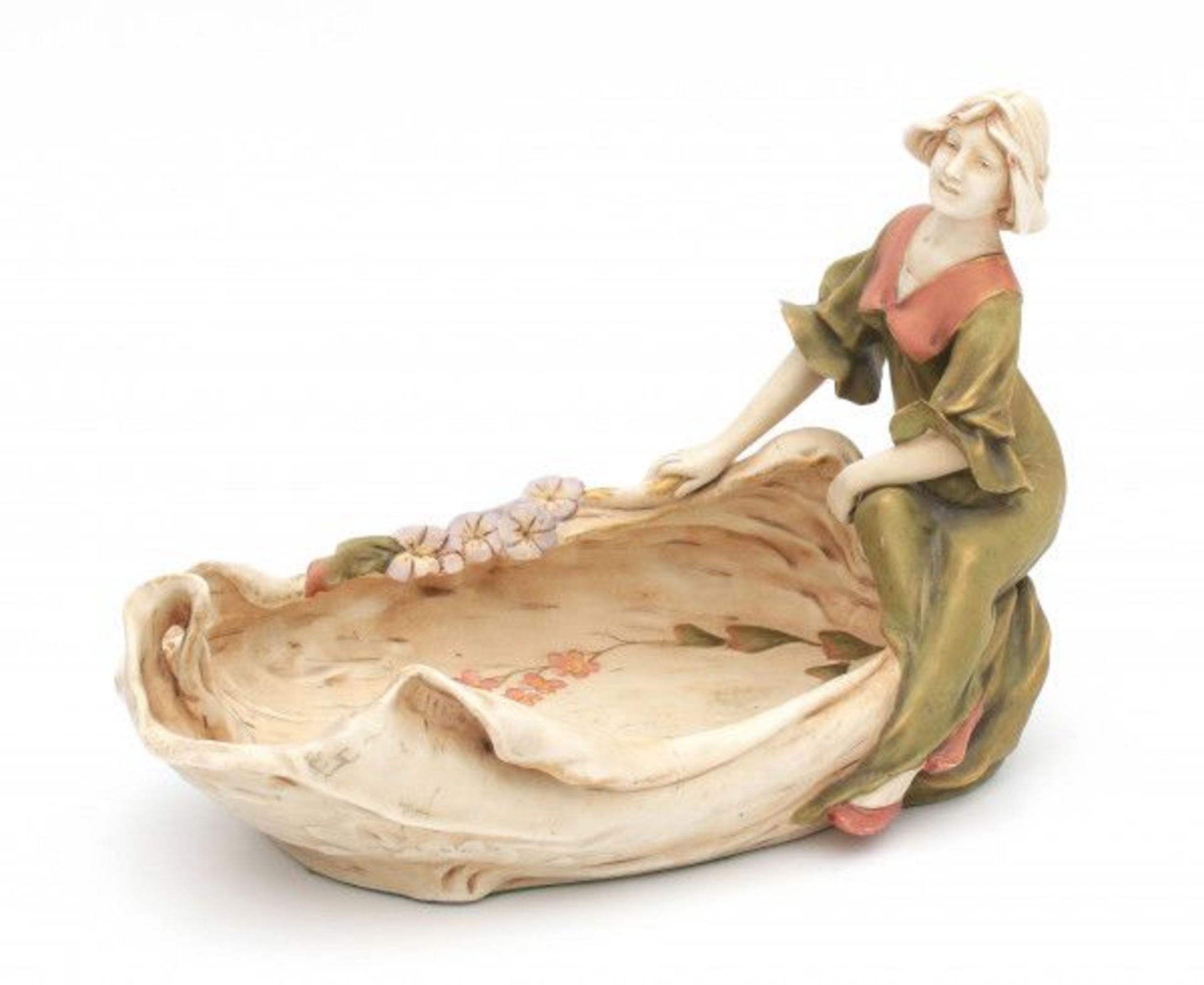 Royal DuxA porcelain shell-shaped bowl with a seated woman, circa 1900-1910, model 835, marked with