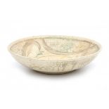 Ryozo Miki (1942)A stoneware dish decorated with incised wavy linear pattern, marked underneath