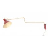 J.J.M. HoogervorstA white and red lacquered metal adjustable wall lamp, produced by Anvia, 1950s.