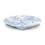 Babs Haenen (1948)A circular porcelain blue/white dish on square base, signed to the reverse and