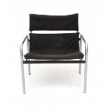 Just MeijerA chromium plated and black lacquered metal easy chair with black canvas upholstery,