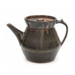 Michael Cardew (1901-1983)A tenmoku glazed stoneware teapot, marked.14,5 cm. h.