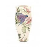 Amphora, OegstgeestA ceramic vase with two grips, decorated with a bird amidst foliage, on white