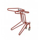 Jaïr Straschnow (1965)A red lacquered bent tubular steel walking frame on wheels with a
