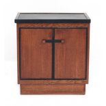 Jan Brunott (1889-1951)A The Hague Style oak and ebonised wooden tea cabinet, the top with separate