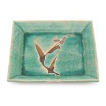 Shoji Hamada (1894-1978), attributedA square ceramic plate with floral brushwork on green ground,