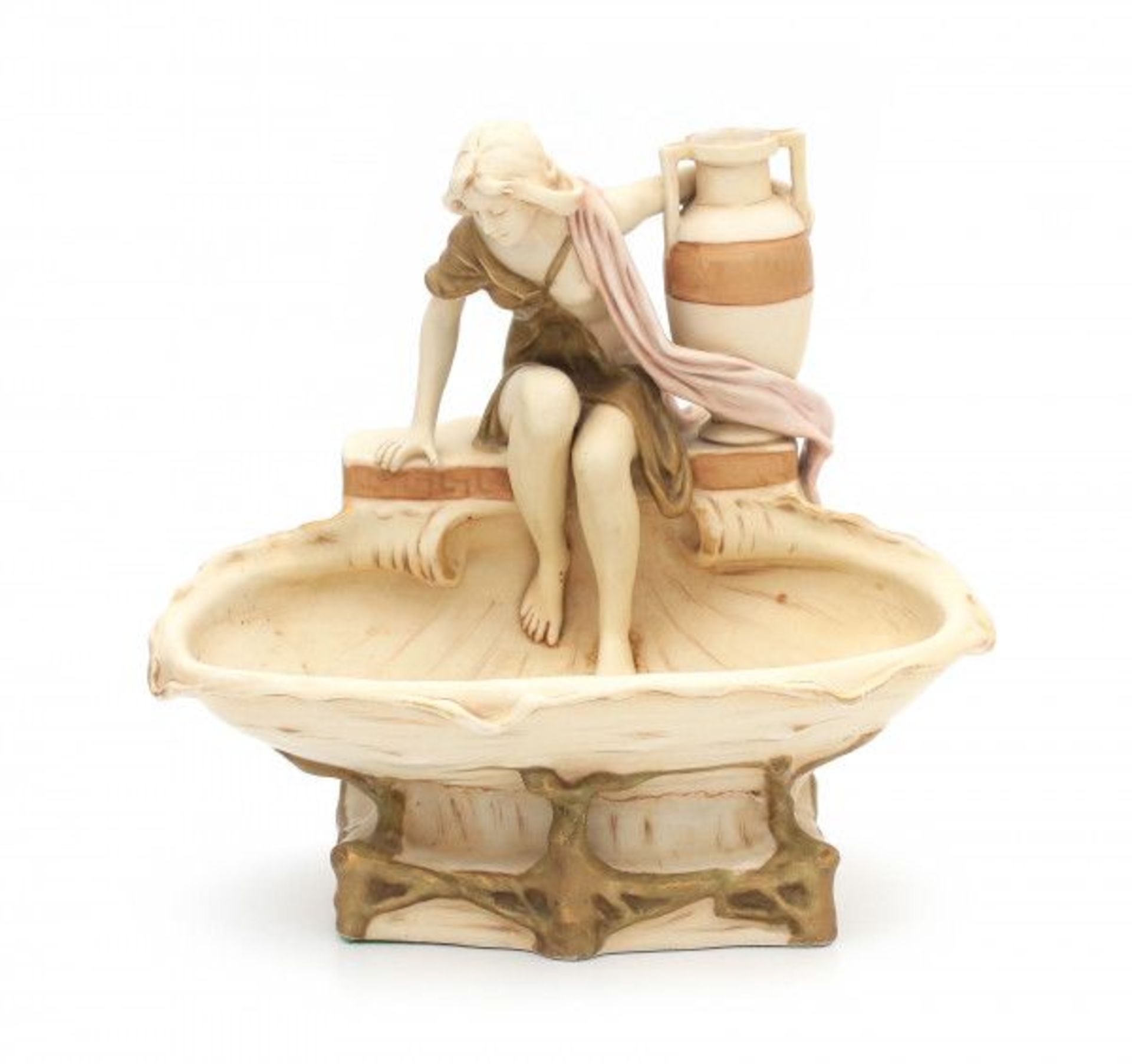 Royal DuxA porcelain shell-shaped bowl with a seated woman with amphora, circa 1900-1910, model