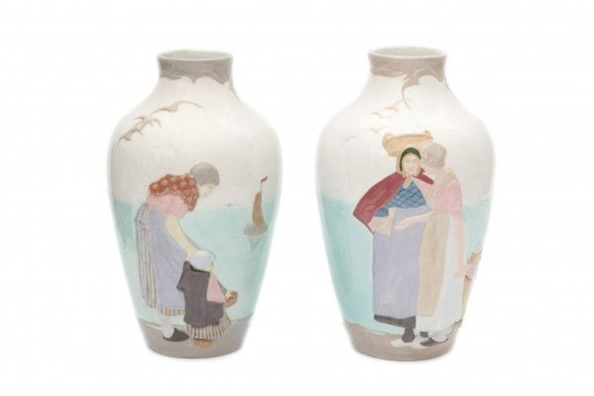 Plateelbakkerij Zuid Holland, GoudaTwo moulded ceramic vases with relief pattern of fisherwomen at