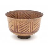 Sonja Landweer (1933)A stoneware bowl glazed with linear pattern in shades of brown, signed