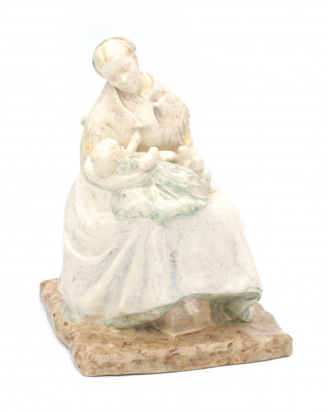 Henri Teixeira de Mattos (1856-1908)A ceramic figure of a seated mother and child, produced by