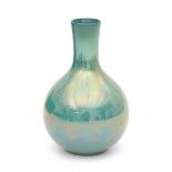 Kunstaardewerkfabriek St. Lukas (1909-1933)A blue ceramic vase with lustre glaze, signed underneath
